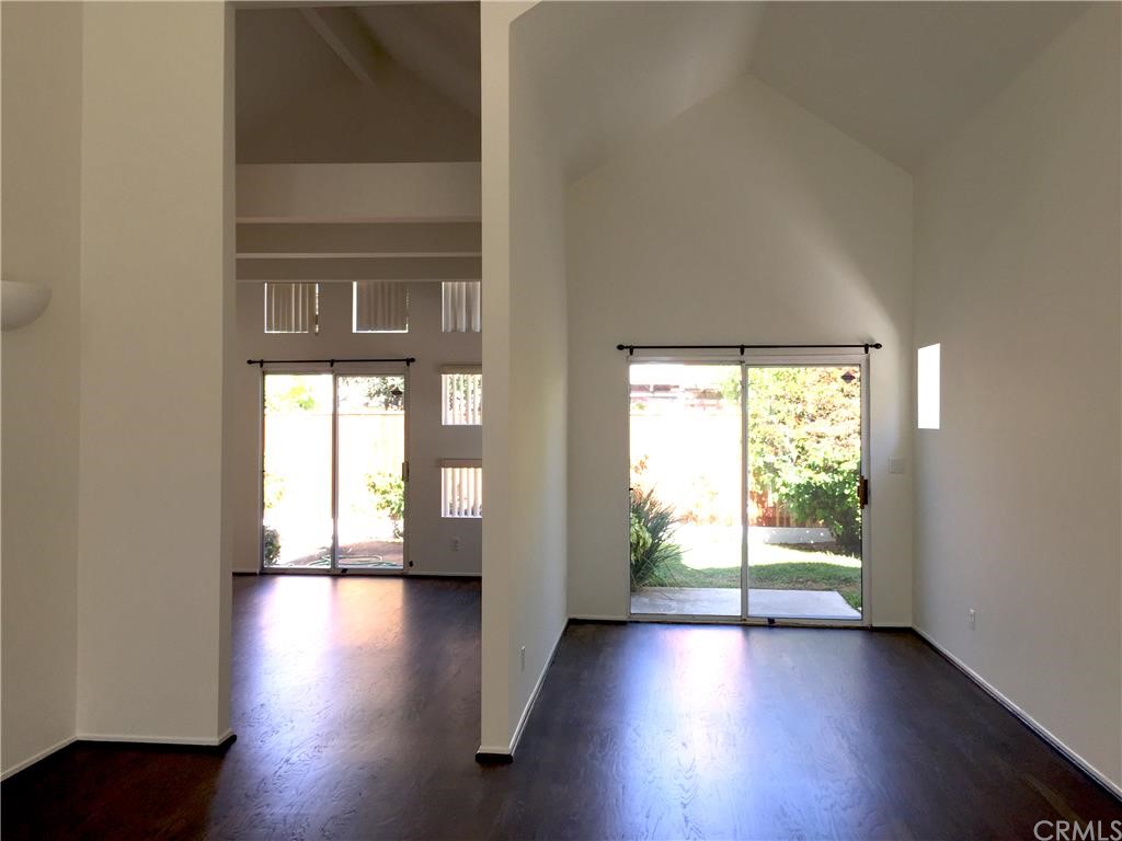 3401 Pine Avenue Manhattan Beach, CA 90266 - Photo 11 of 24 an empty room with wooden floor and windows