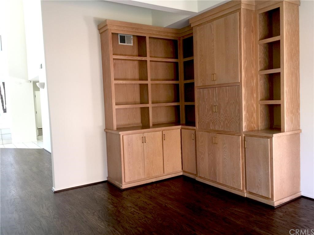 3401 Pine Avenue Manhattan Beach, CA 90266 - Photo 12 of 24 a view of an empty room with wooden floor and a window