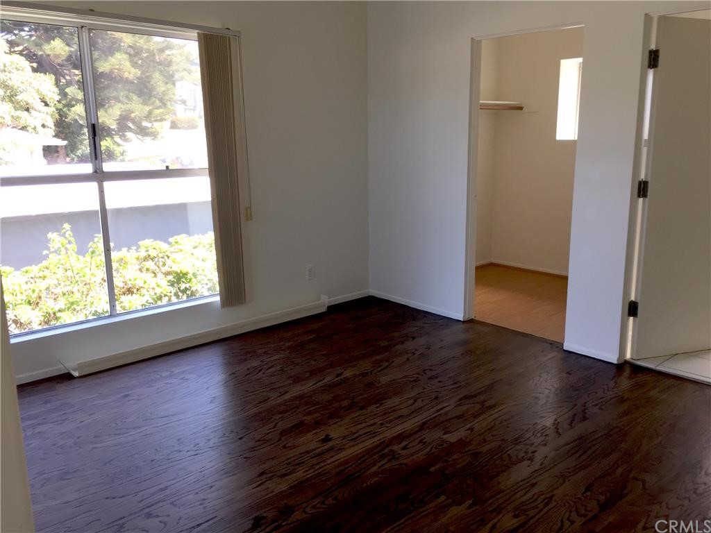 3401 Pine Avenue Manhattan Beach, CA 90266 - Photo 18 of 24 an empty room with wooden floor and windows