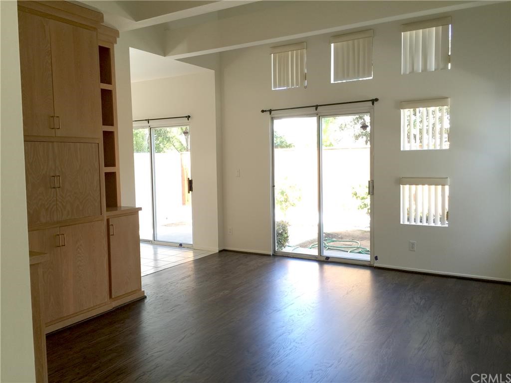 3401 Pine Avenue Manhattan Beach, CA 90266 - Photo 22 of 24 an empty room with wooden floor and windows