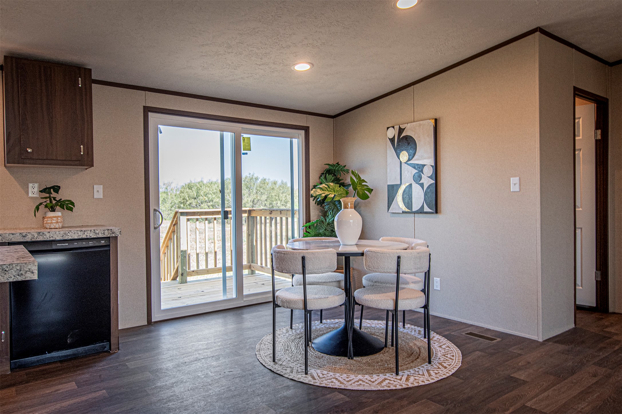 135 Spanish Oak Road Dale, TX 78616 - Photo 11 of 30 a dining room with furniture and wooden floor