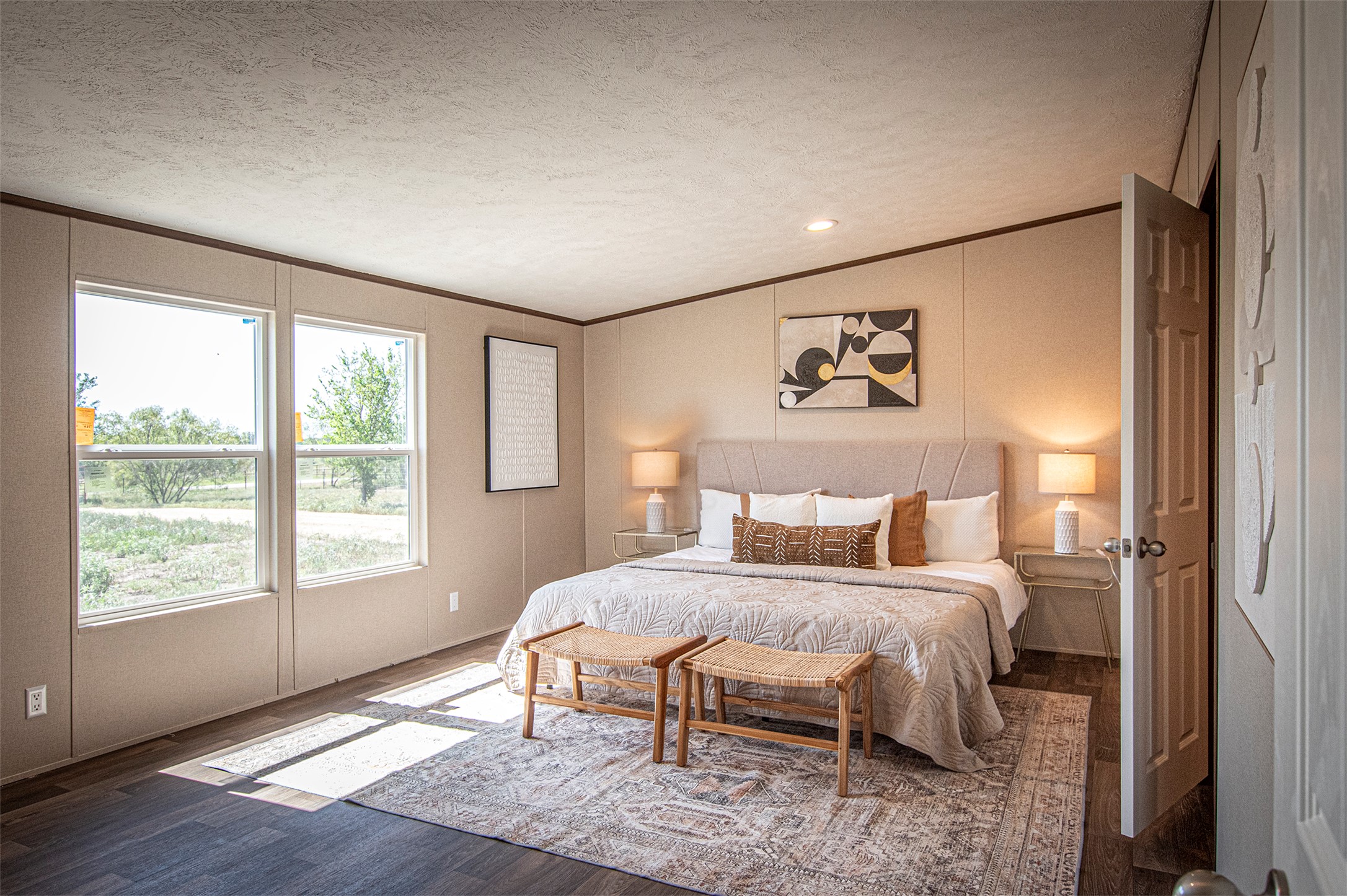 135 Spanish Oak Road Dale, TX 78616 - Photo 12 of 30 a bedroom with a bed and a large window