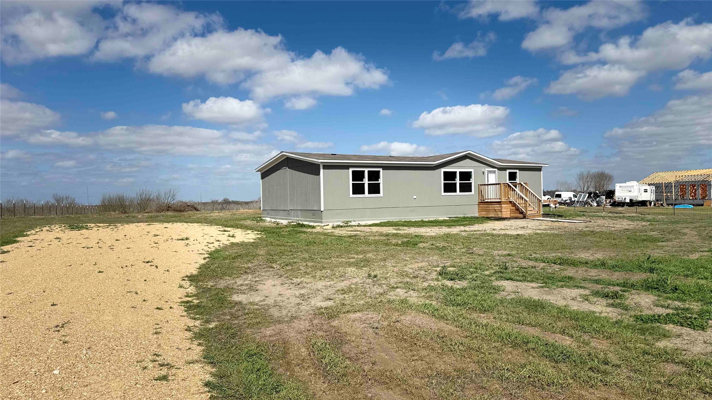 135 Spanish Oak Road Dale, TX 78616 - Photo 25 of 30 a view of a house with a backyard