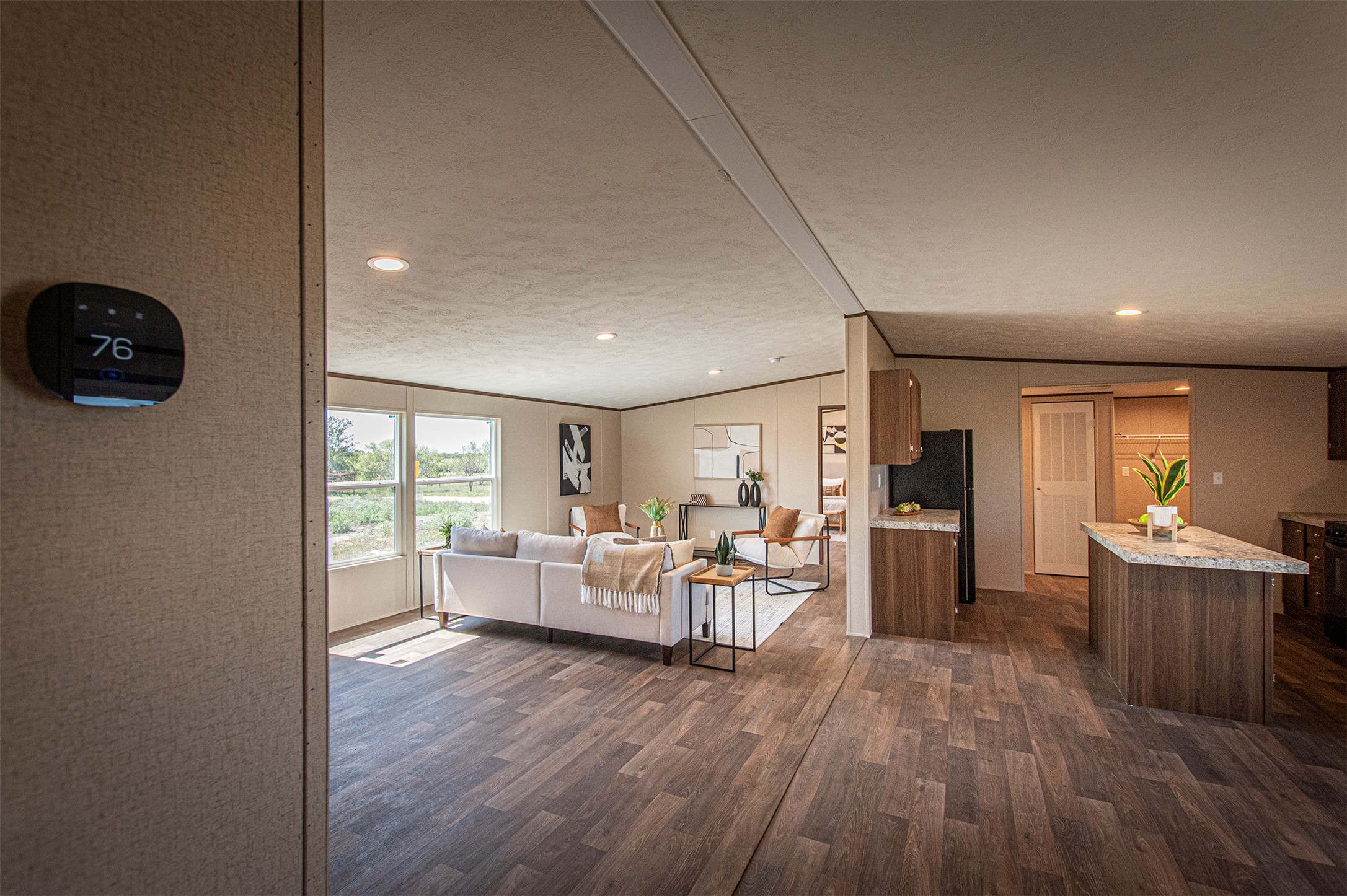 135 Spanish Oak Road Dale, TX 78616 - Photo 7 of 30 a living room with furniture and a wooden floor