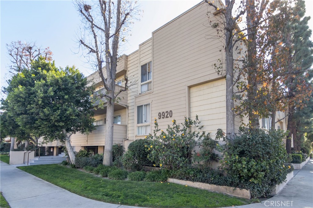 9920 Jordan Avenue, Unit 19 Chatsworth, CA 91311 - Photo 1 of 25 a house that has a tree in front of the house