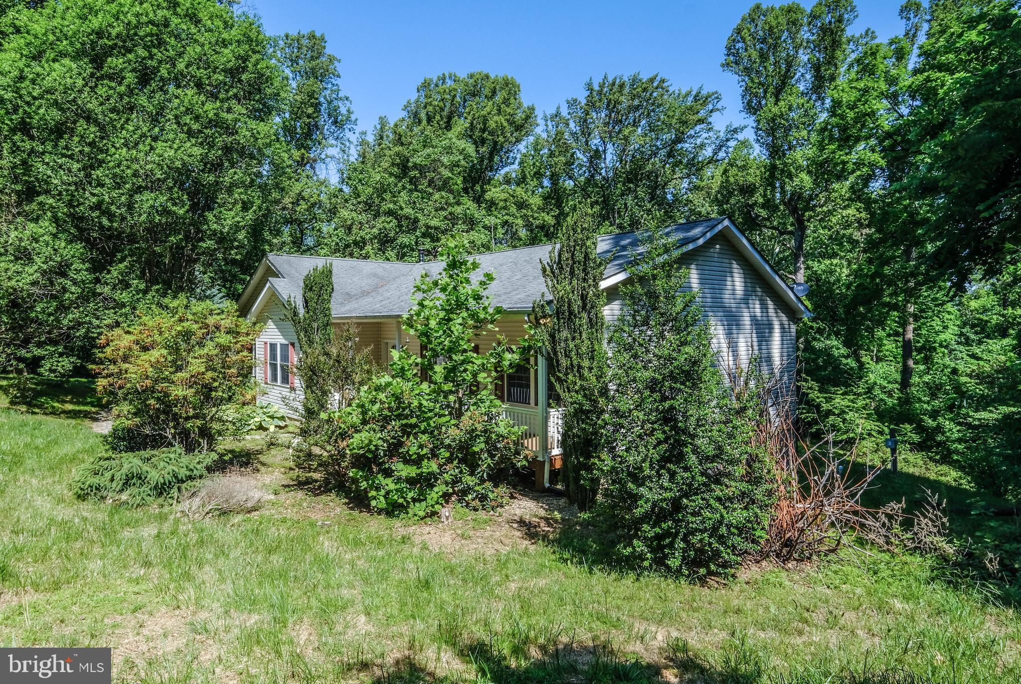 1195 Shangri-La Road Bentonville, VA 22610 - Photo 5 of 64 an outdoor view of house with green space