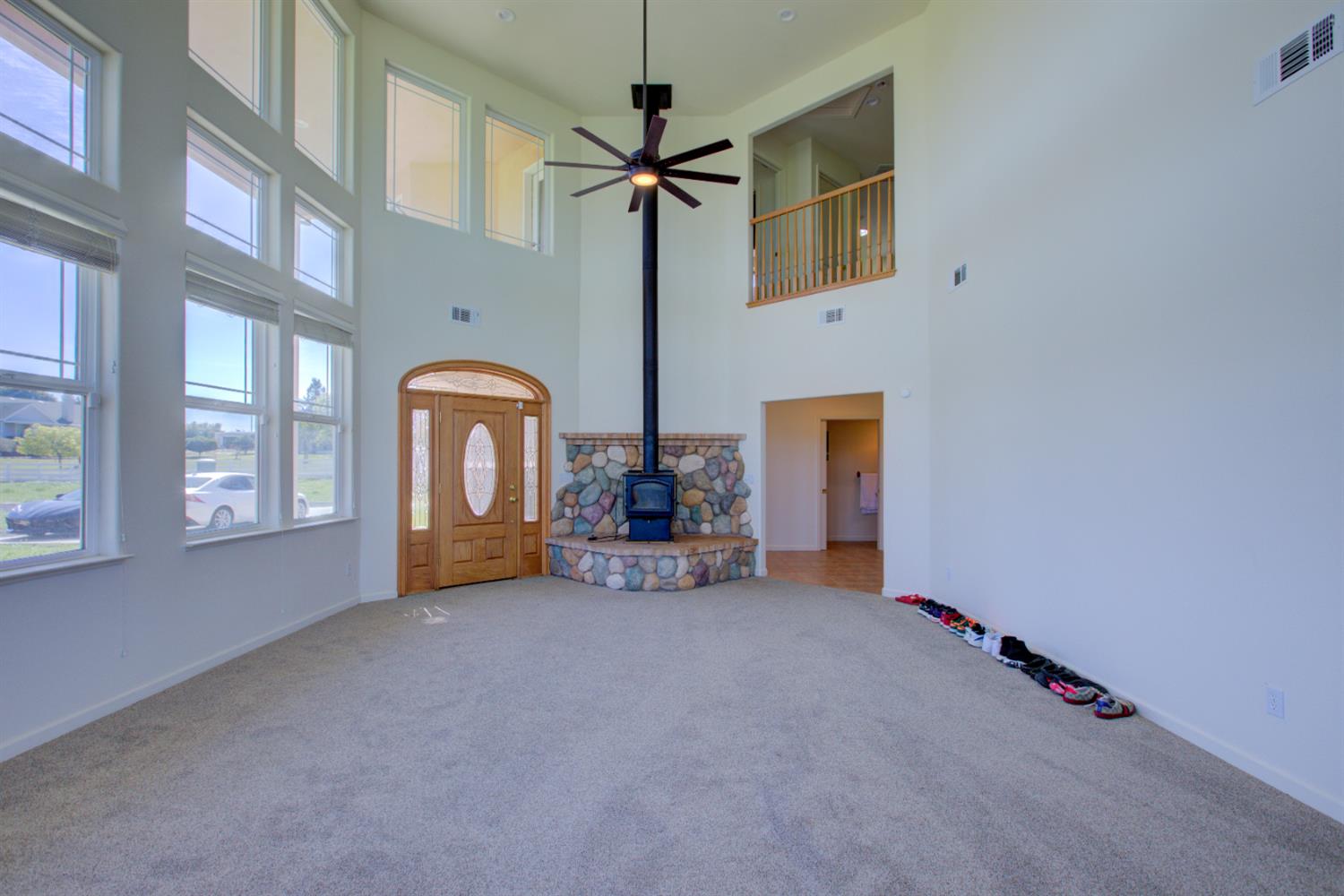 9681 Wamble Road Oakdale, CA 95361 - Photo 23 of 50 a view of a livingroom with furniture and a ceiling fan