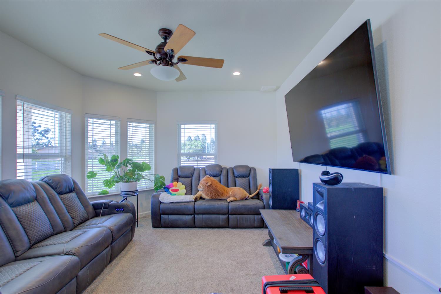 9681 Wamble Road Oakdale, CA 95361 - Photo 25 of 50 a living room with furniture and a flat screen tv
