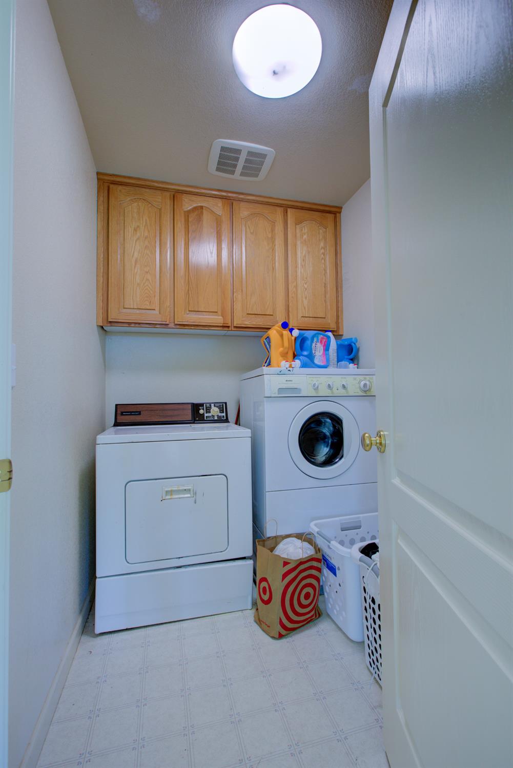 9681 Wamble Road Oakdale, CA 95361 - Photo 26 of 50 a utility room with dryer and washer