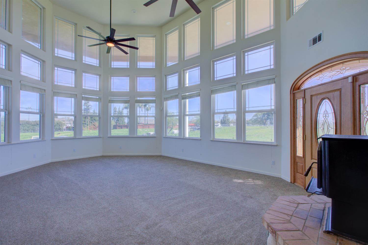 9681 Wamble Road Oakdale, CA 95361 - Photo 3 of 50 a view of an empty room with a window