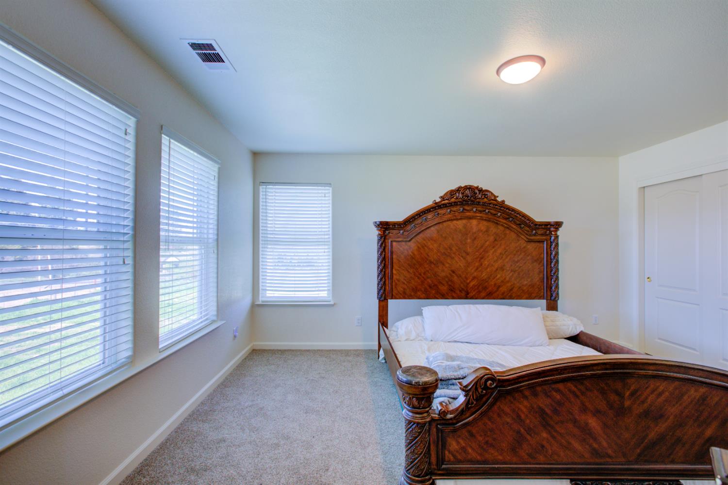 9681 Wamble Road Oakdale, CA 95361 - Photo 32 of 50 a room with a bed and window