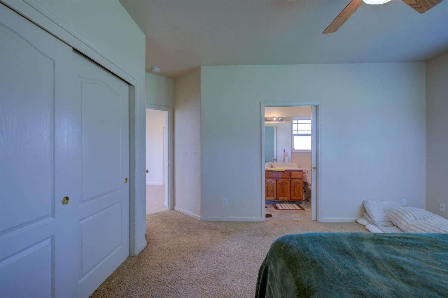 9681 Wamble Road Oakdale, CA 95361 - Photo 39 of 50 a bed room with a bed and furniture