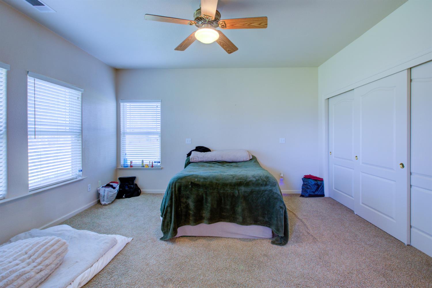 9681 Wamble Road Oakdale, CA 95361 - Photo 45 of 50 a bedroom with a bed and window