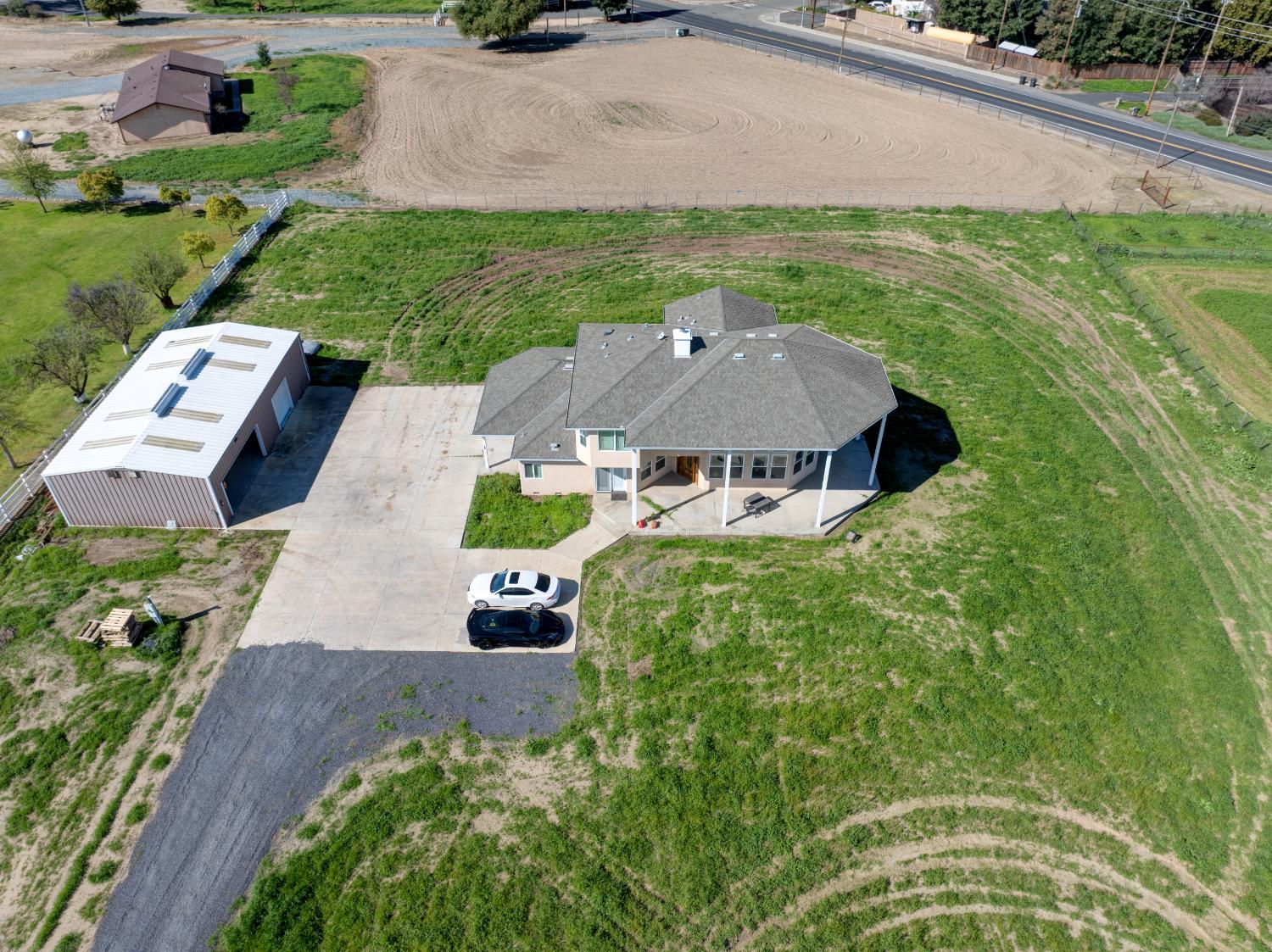 9681 Wamble Road Oakdale, CA 95361 - Photo 49 of 50 an aerial view of a house with garden space and street view