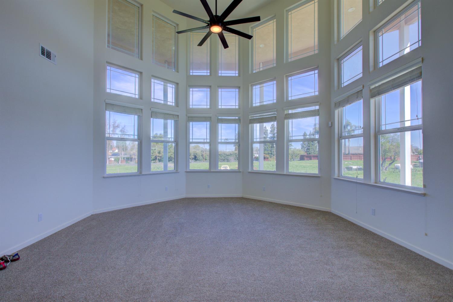 9681 Wamble Road Oakdale, CA 95361 - Photo 5 of 50 a view of an empty room with a window