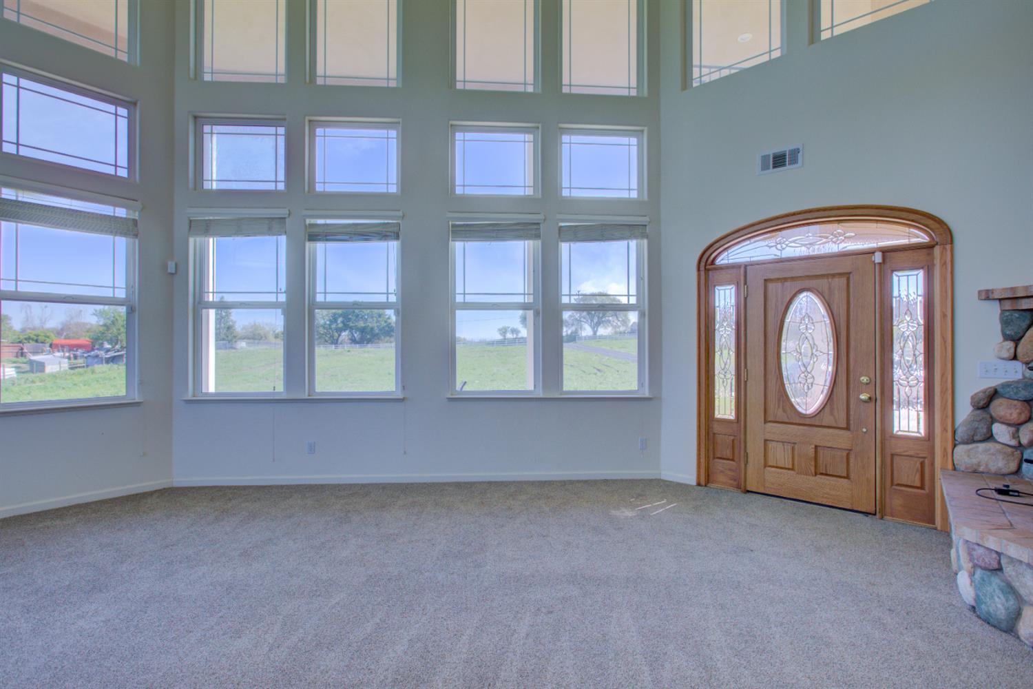 9681 Wamble Road Oakdale, CA 95361 - Photo 6 of 50 a view of front door with washer and dryer