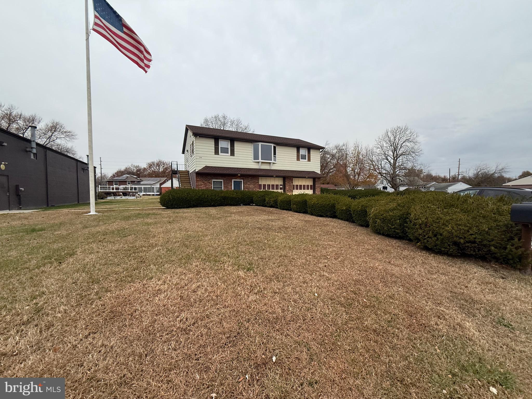 344 North Virginia Avenue Carneys Point, NJ 08069 - Photo 1 of 16 a view of a house with a yard