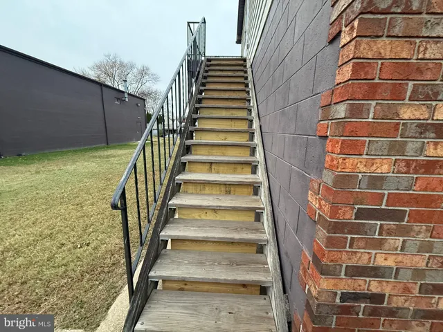 a view of a row of stairs leading up to a building