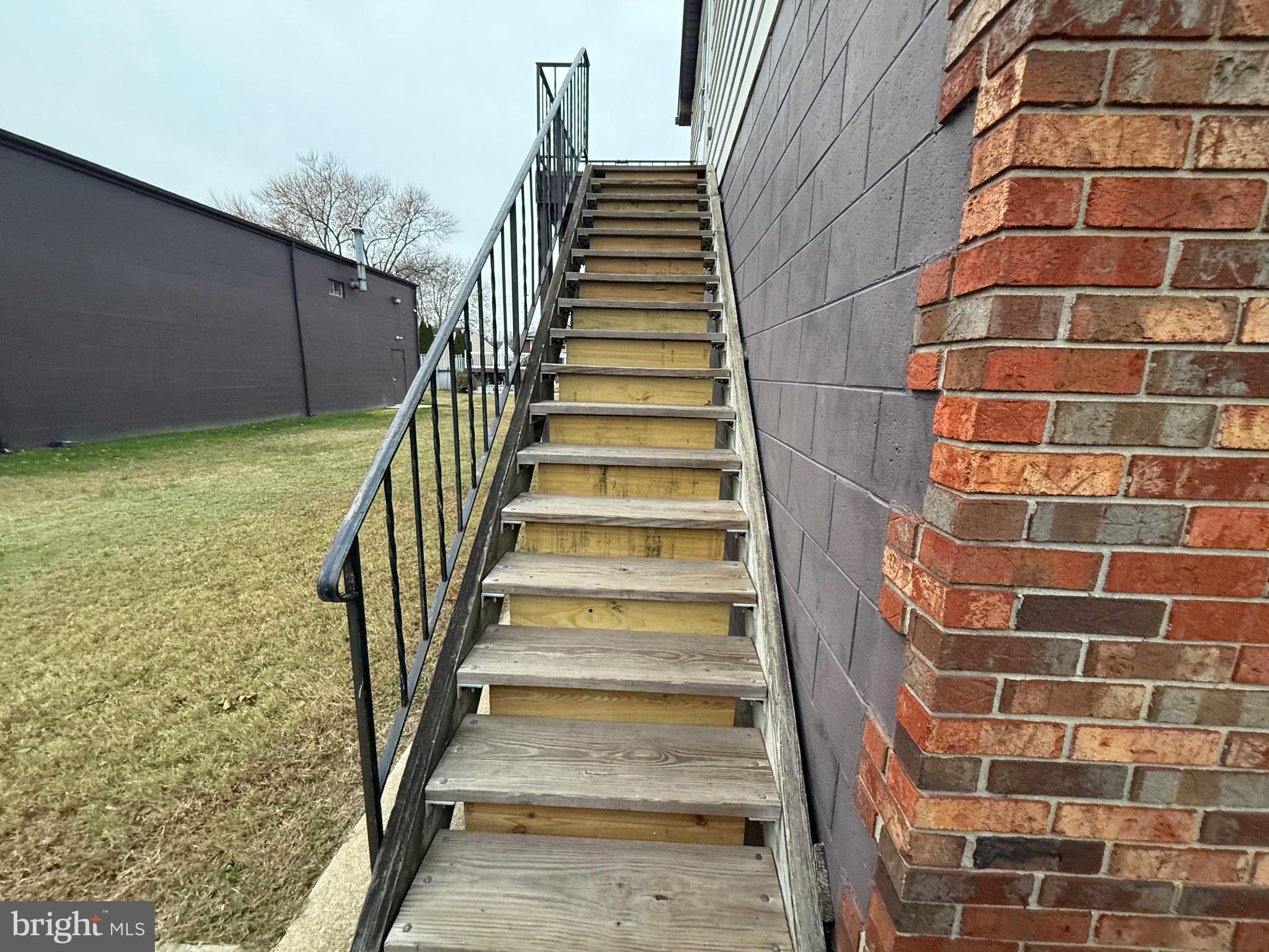 344 North Virginia Avenue Carneys Point, NJ 08069 - Photo 2 of 16 a view of a row of stairs leading up to a building