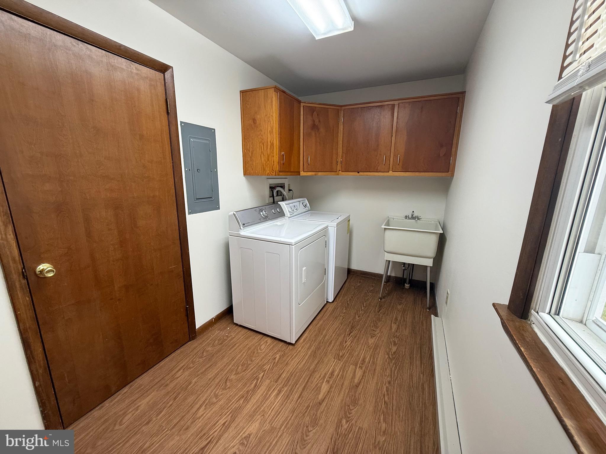 344 North Virginia Avenue Carneys Point, NJ 08069 - Photo 4 of 16 a view of a room with a sink and wooden floor