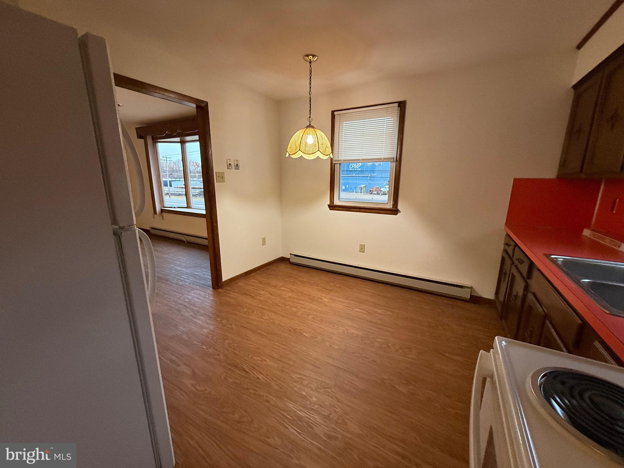 344 North Virginia Avenue Carneys Point, NJ 08069 - Photo 5 of 16 a view of a room with wooden floor and a window