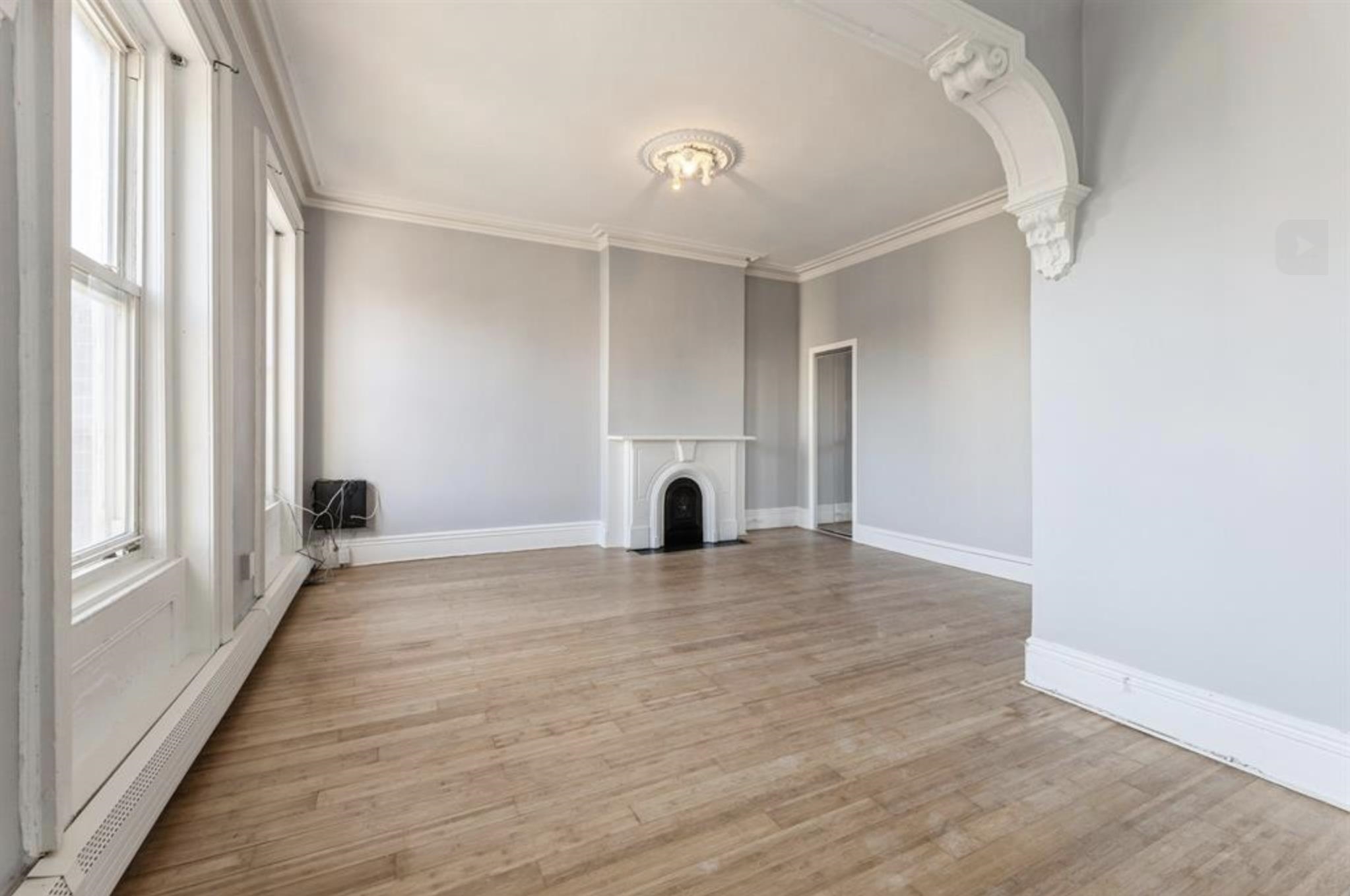 291 Forrest Street, Unit 2 Jersey City, NJ 07304 - Photo 14 of 17 a view of empty room with a fireplace
