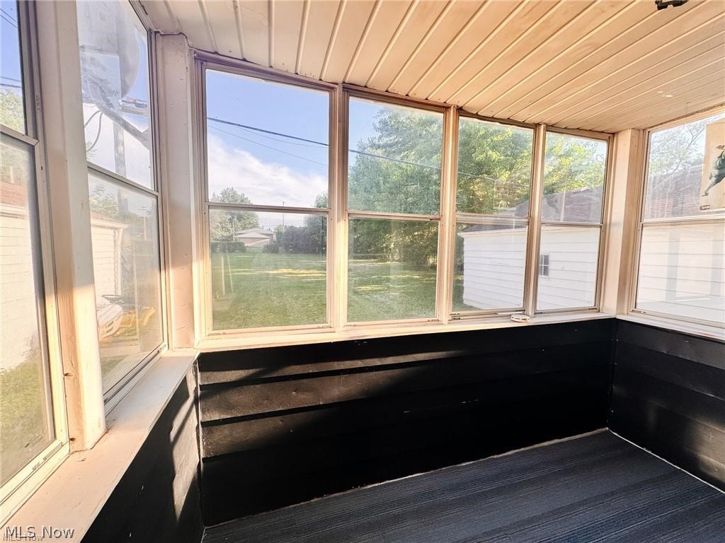 2907 Snow Road, Unit UP Cleveland, OH 44134 - Photo 15 of 19 Unfurnished sunroom featuring wood ceiling
