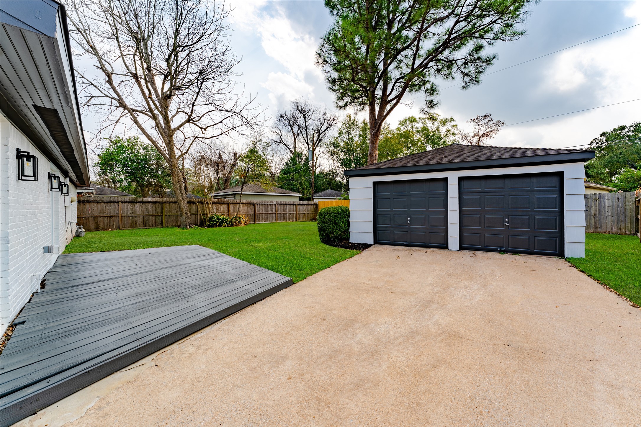 6027 Valkeith Drive Houston, TX 77096 - Photo 29 of 31 a house with a yard