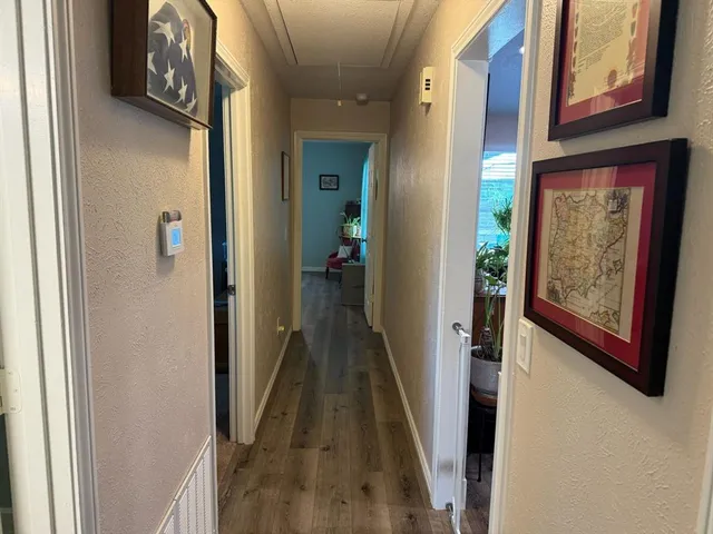 a view of a hallway with elevator