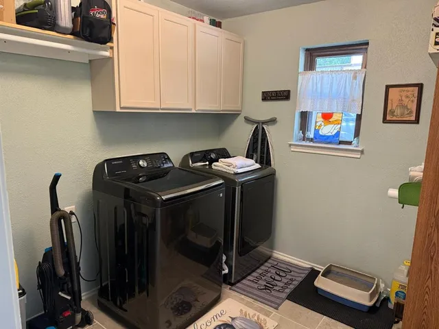 a utility room with closet