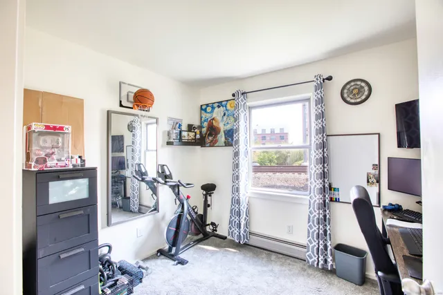 a view of a room with gym equipment