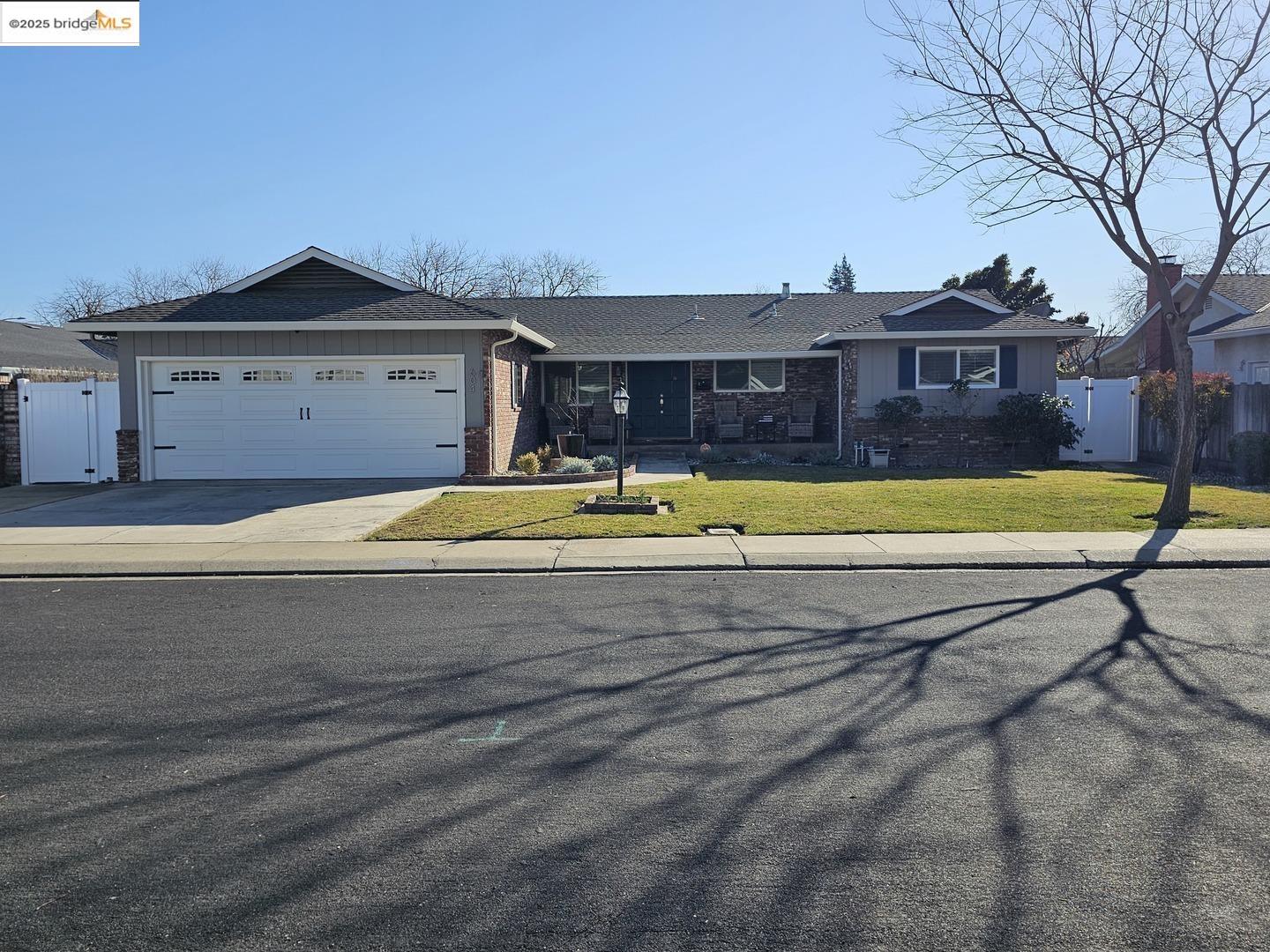 a view of house with a swimming pool