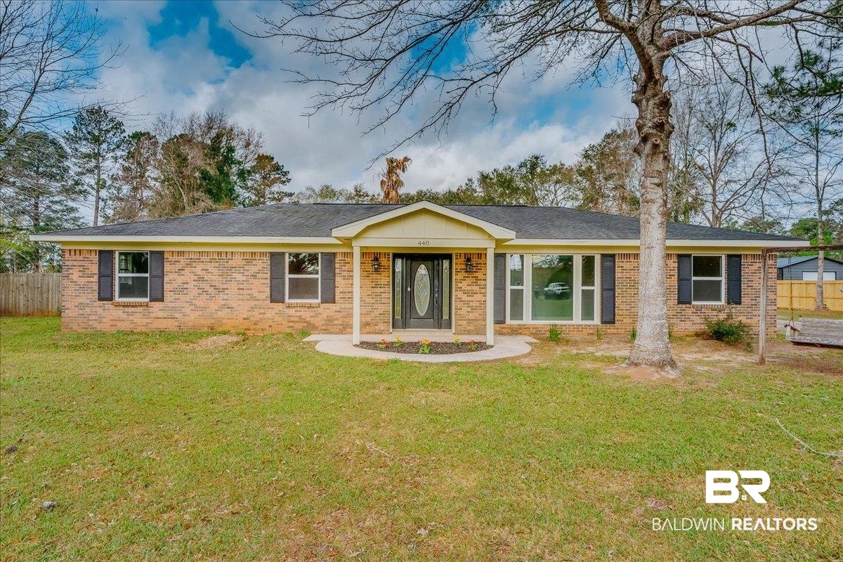 440 Dykes Road Mobile, AL 36608 - Photo 48 of 49 Ranch-style house featuring a front lawn, fence, and brick siding