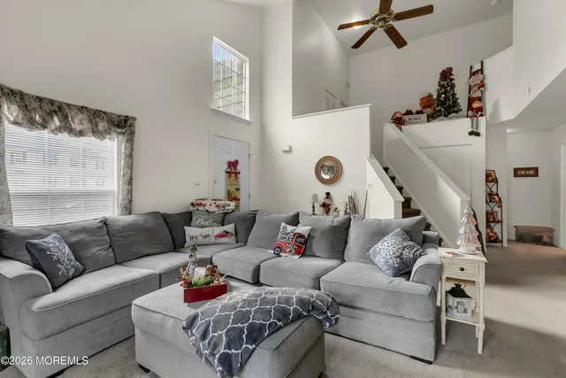 a living room with furniture and a couch
