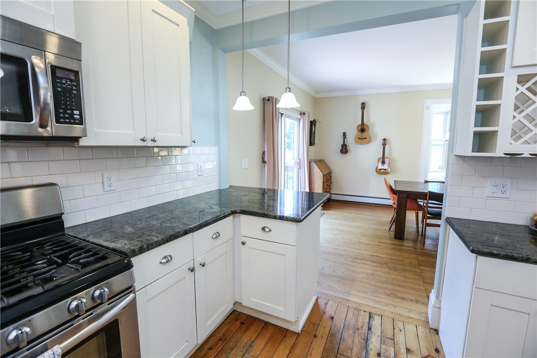 244 Barrington Street Rochester, NY 14607 - Photo 13 of 30 Breakfast bar from the Dining room is great for a