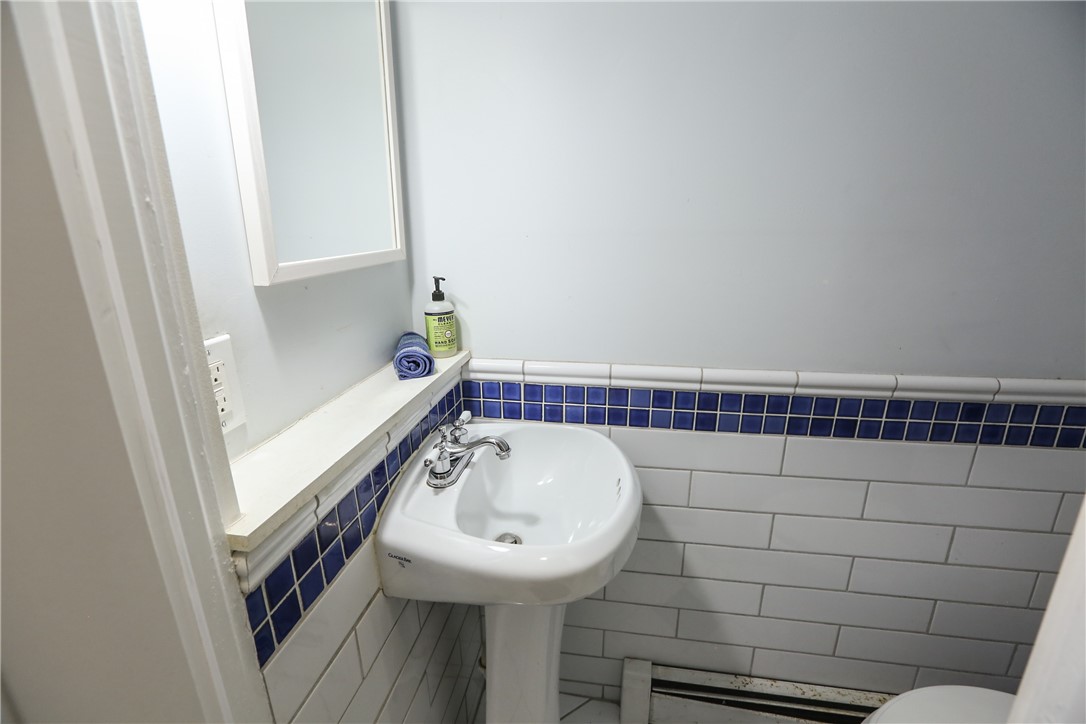 244 Barrington Street Rochester, NY 14607 - Photo 14 of 30 1st floor powder room located off the side entranc