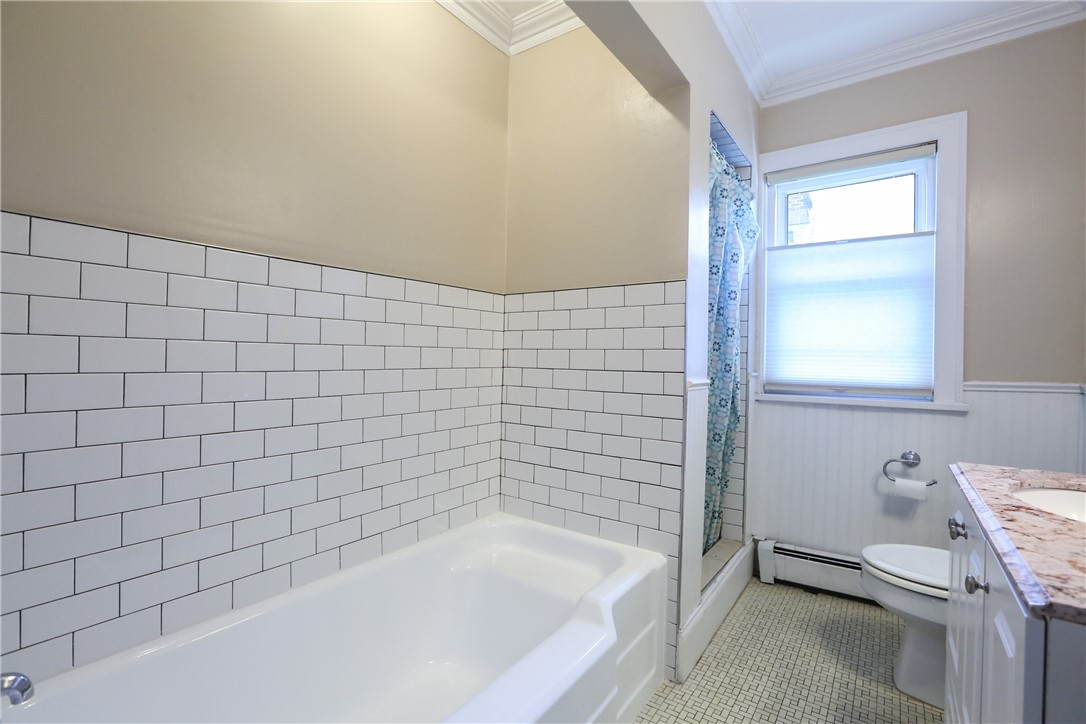 244 Barrington Street Rochester, NY 14607 - Photo 23 of 30 Main bath with a soaking tub & separate shower
