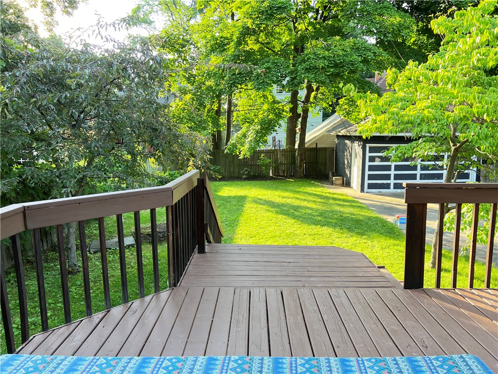 244 Barrington Street Rochester, NY 14607 - Photo 27 of 30 View of the fully fenced back yard & 2 car garage.