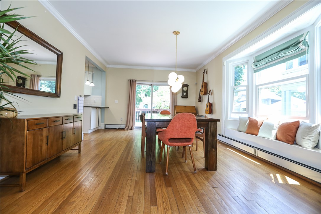 244 Barrington Street Rochester, NY 14607 - Photo 8 of 30 Dining room, with window seat & sliding glass door