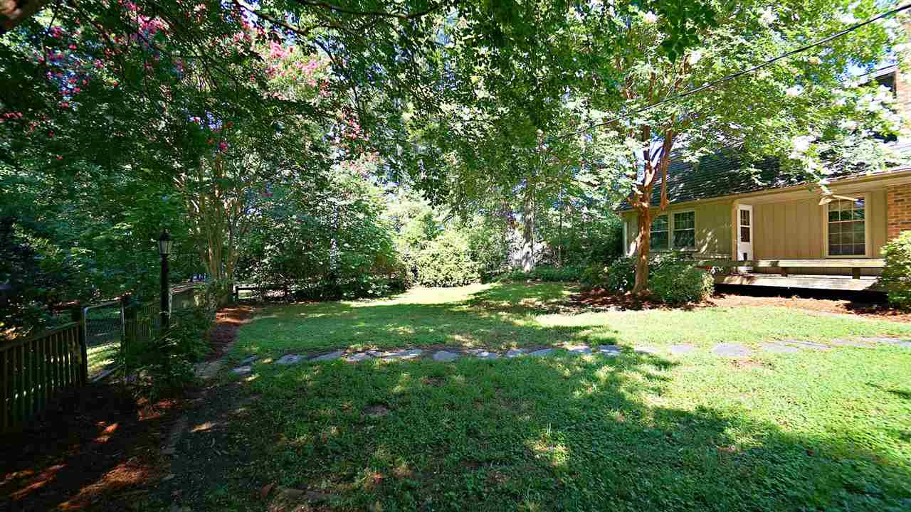 1421 Lynn Road Raleigh, NC 27612 - Photo 6 of 30 Private, serene, and endless opportunities. Have a garden, playground, outdoor kitchen & more Peaceful, quiet and fenced Exterior Back