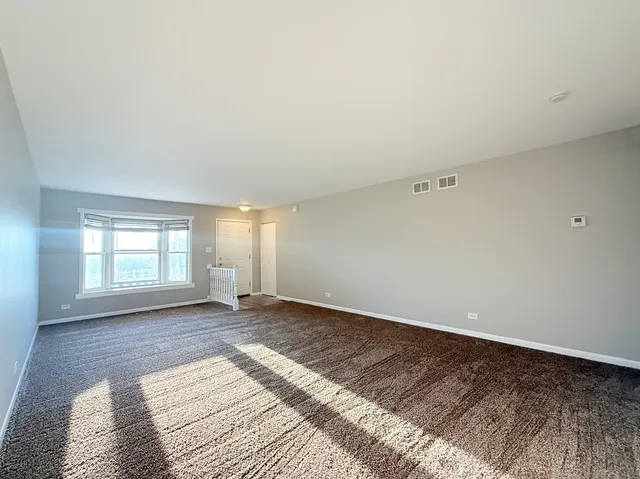 a view of a room with a window