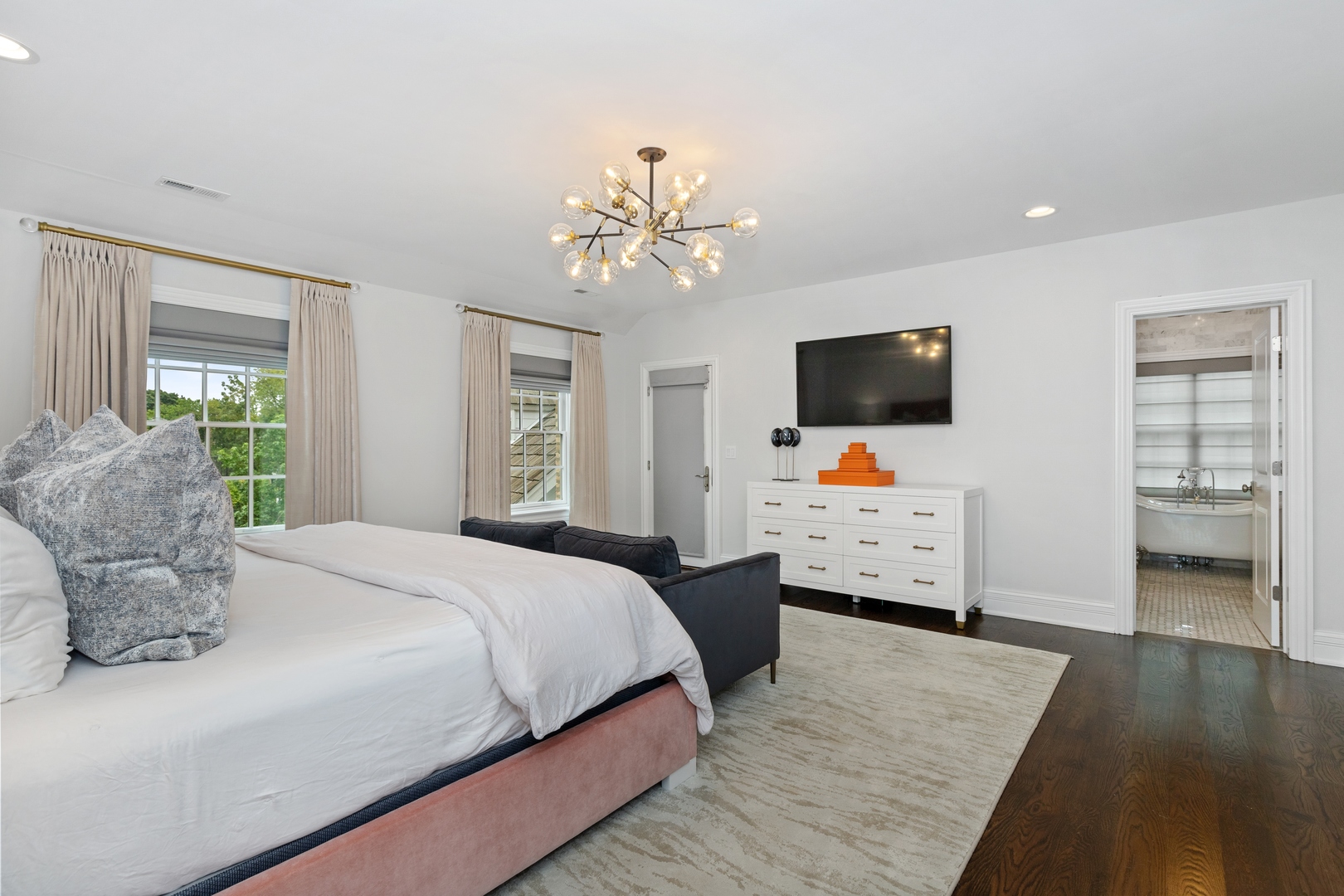 739 East Illinois Road Lake Forest, IL 60045 - Photo 19 of 39 a bedroom with a bed and a flat screen tv