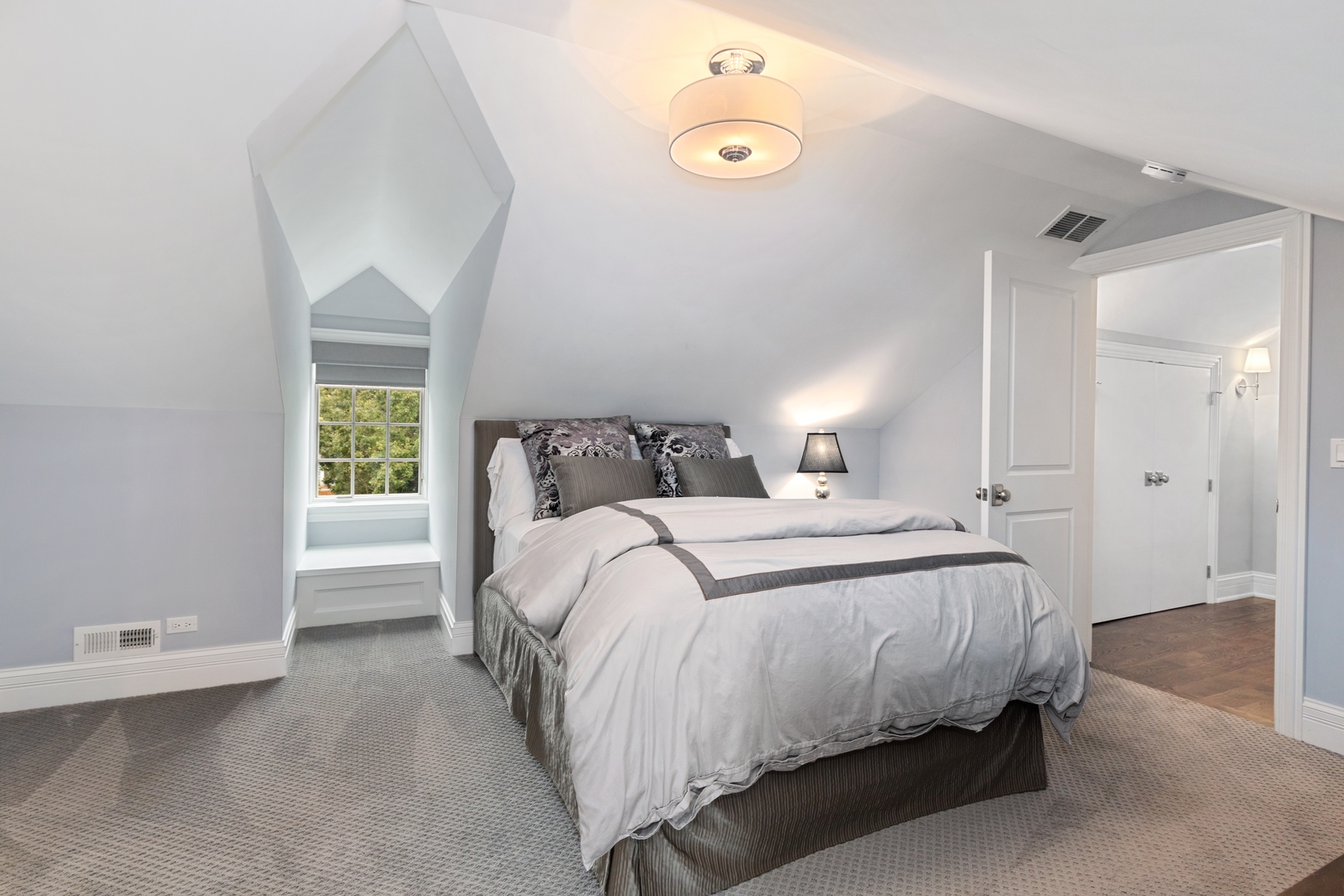 739 East Illinois Road Lake Forest, IL 60045 - Photo 23 of 39 a bedroom with a bed and a window