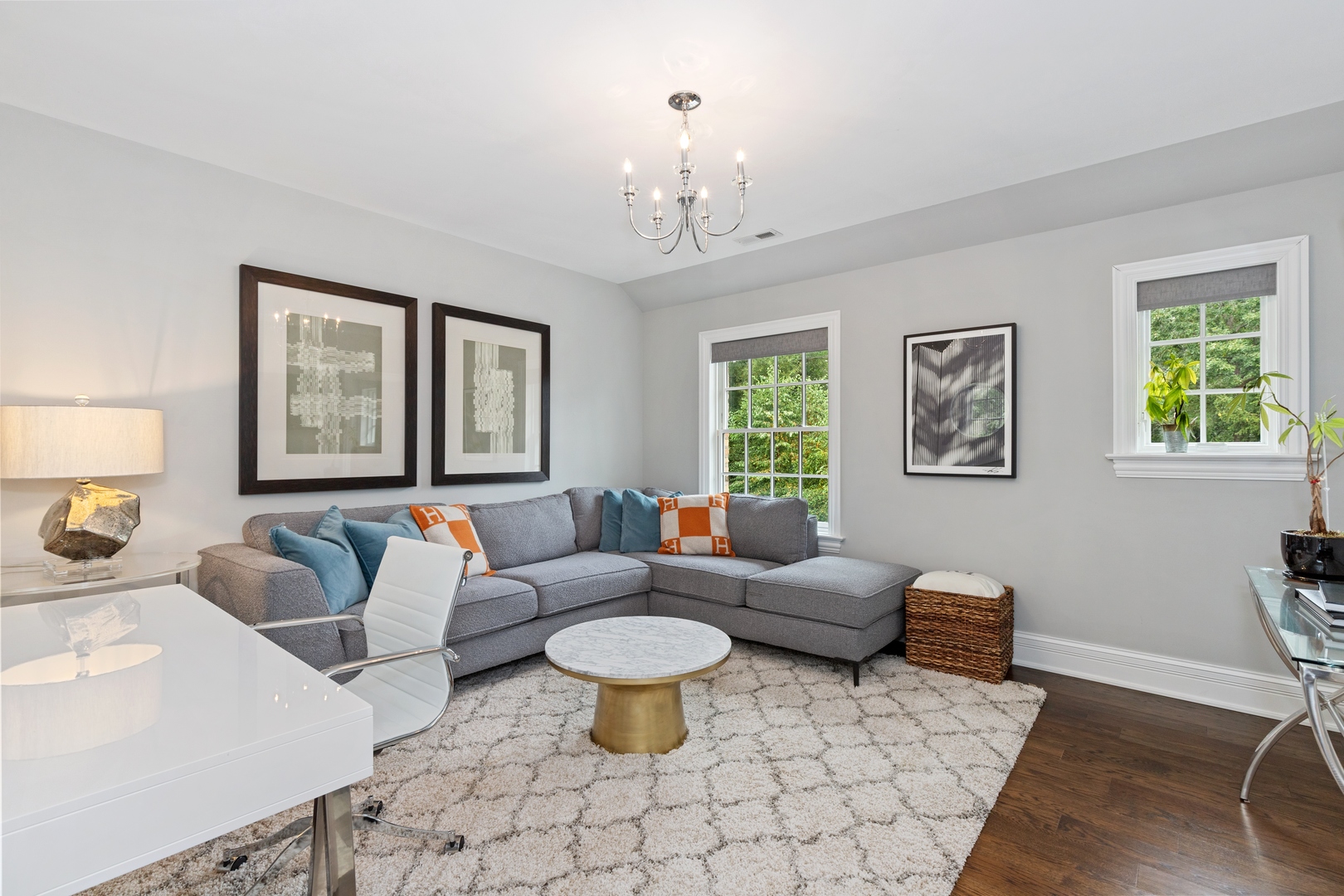 739 East Illinois Road Lake Forest, IL 60045 - Photo 24 of 39 a living room with furniture a chandelier and a window