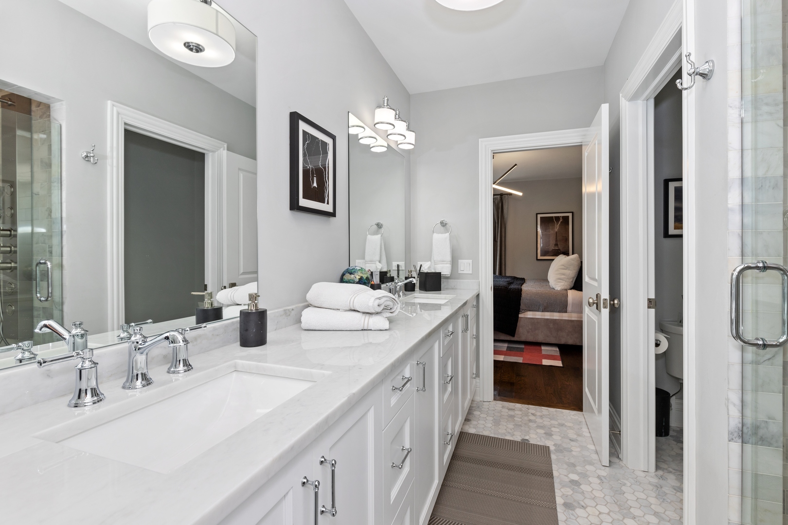 739 East Illinois Road Lake Forest, IL 60045 - Photo 27 of 39 a bathroom with a double vanity sink and a mirror