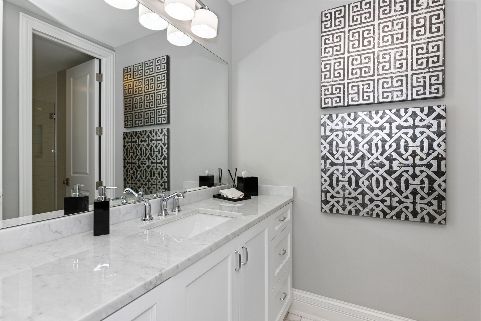 739 East Illinois Road Lake Forest, IL 60045 - Photo 28 of 39 a bathroom with a sink vanity granite and a mirror
