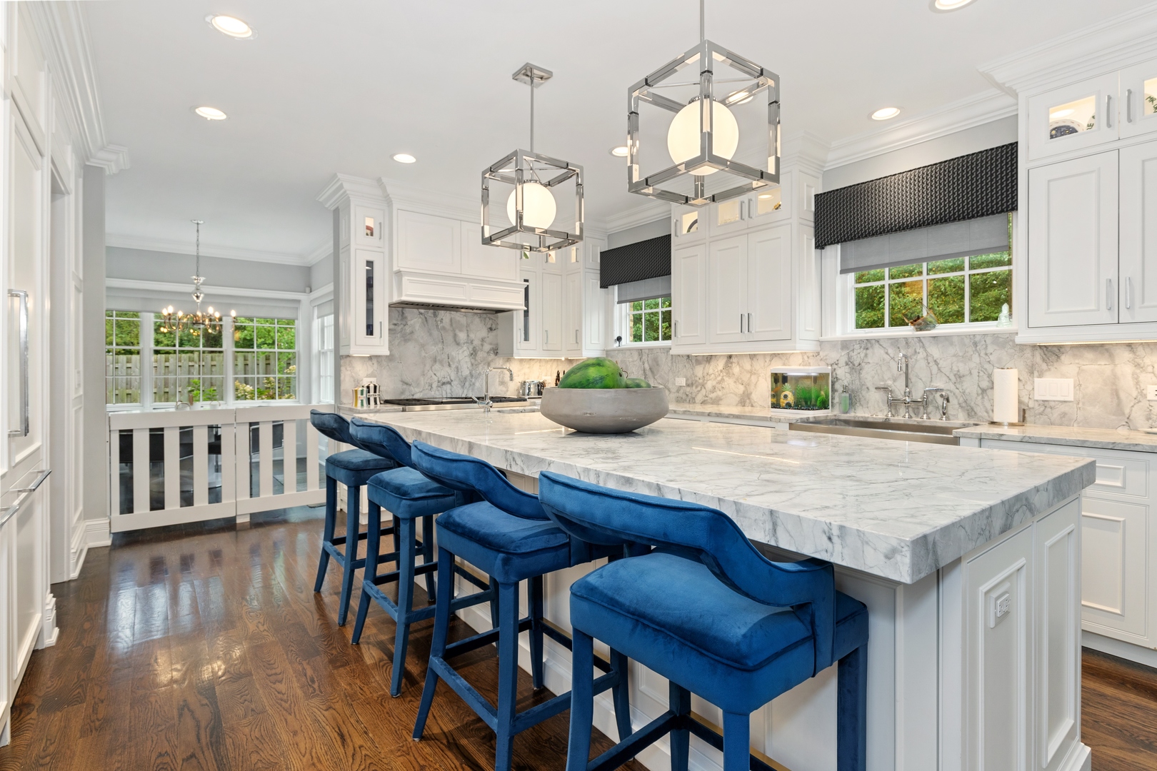 739 East Illinois Road Lake Forest, IL 60045 - Photo 5 of 39 a kitchen with granite countertop a table chairs in it and wooden floors