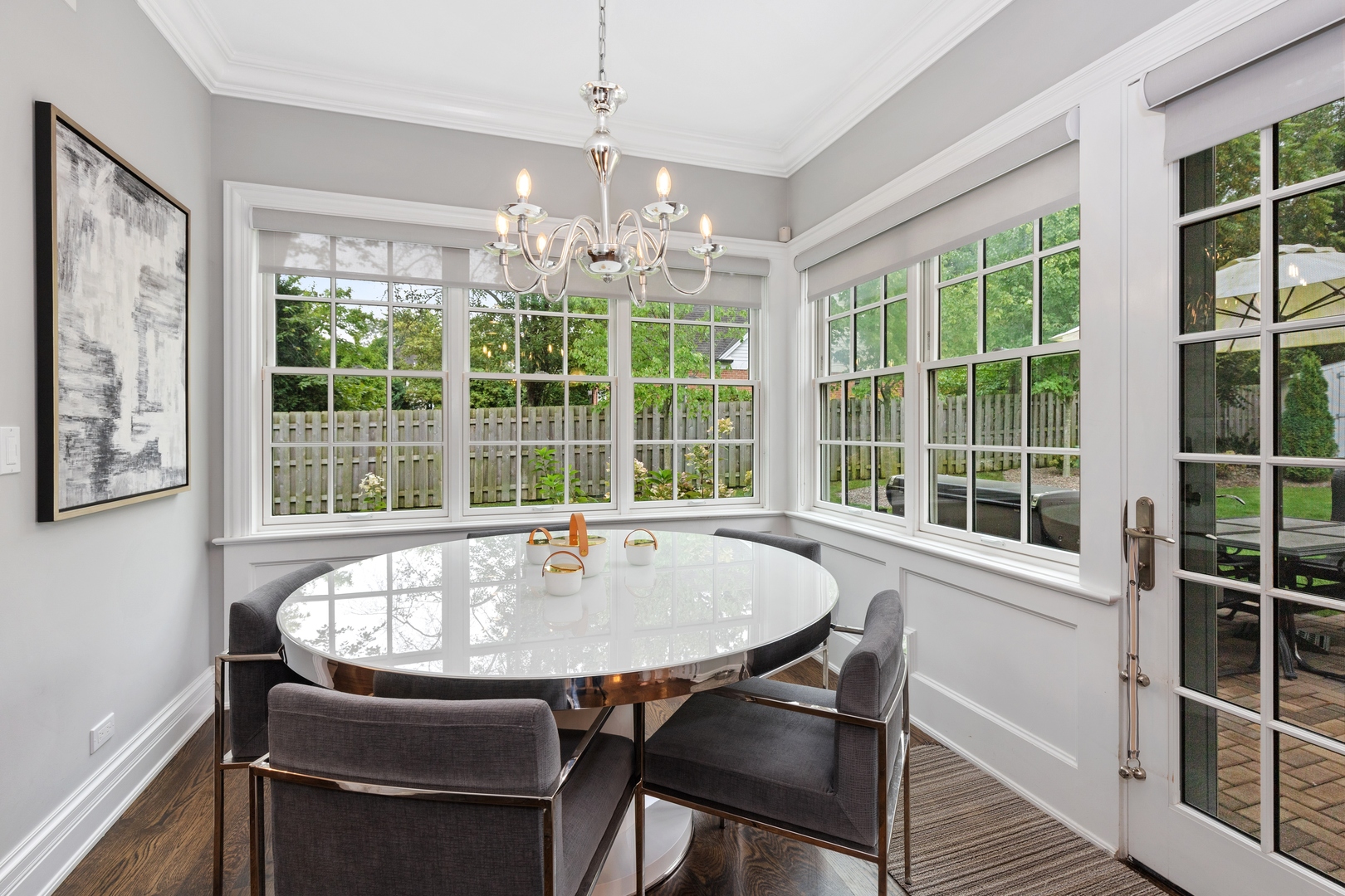 739 East Illinois Road Lake Forest, IL 60045 - Photo 10 of 39 a dining room with furniture large windows and a chandelier