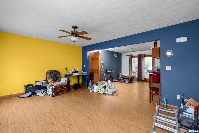 a living room with furniture and natural light