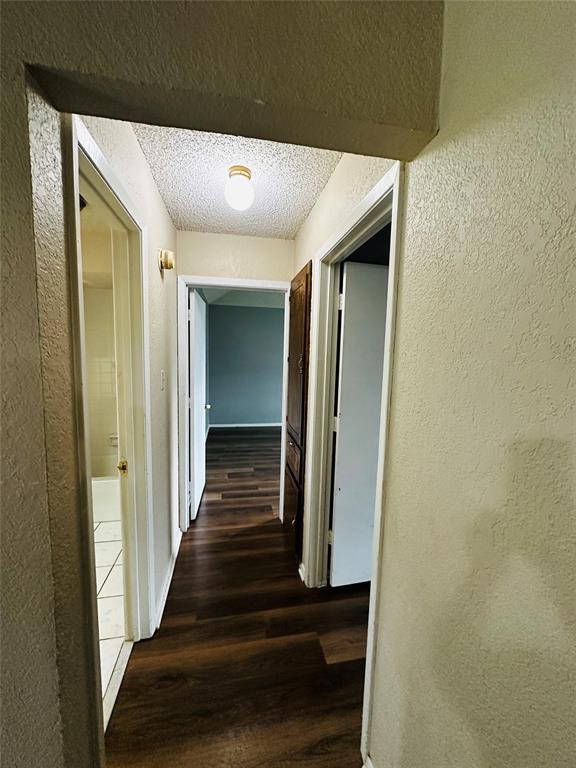 6741 Ridgetop Road North Richland Hills, TX 76182 - Photo 40 of 40 Split floorplan. Hallway leading to secondary bedrooms and bath.